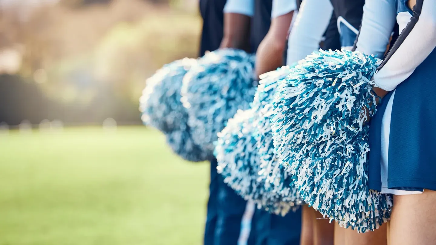 How many credit cheerleaders are on the sidelines?